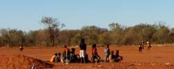 A group of Indigenous Australian children playing in the outback. A group of Indigenous Australian children playing in the outback.