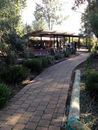 paved path leading to a shelter shed paved path leading to a shelter shed